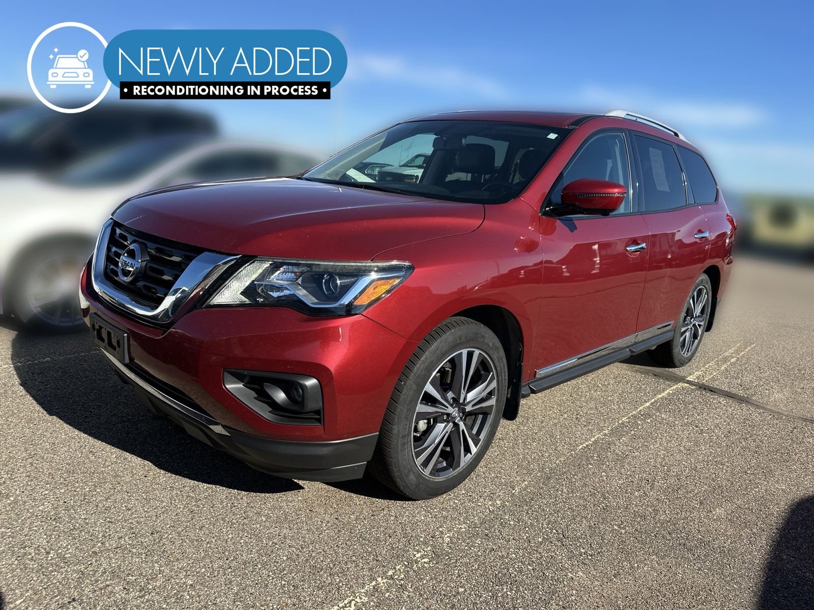 Used 2017 Red Nissan Platinum image 1
