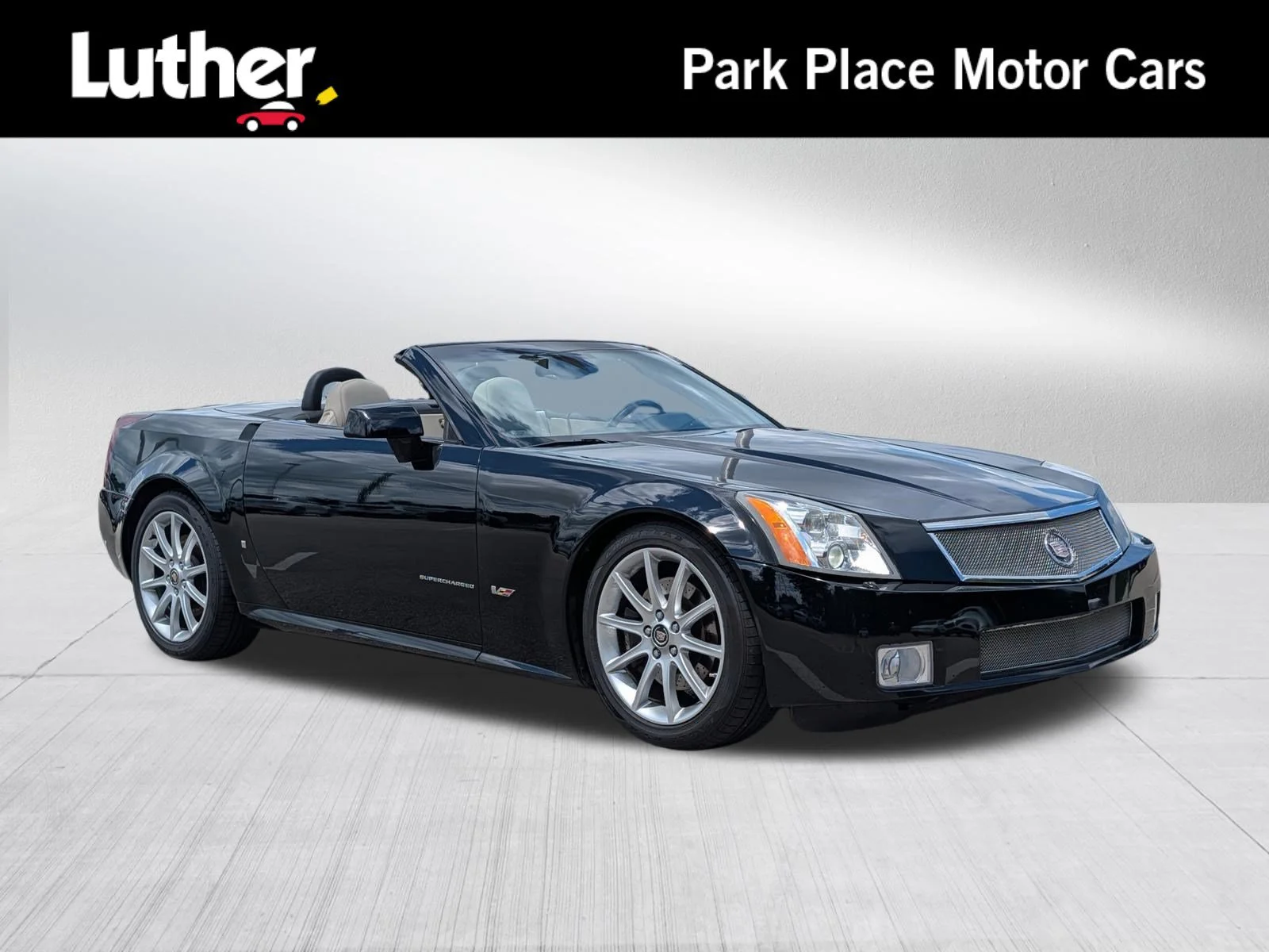 Used 2006 Black Raven Cadillac  image 1