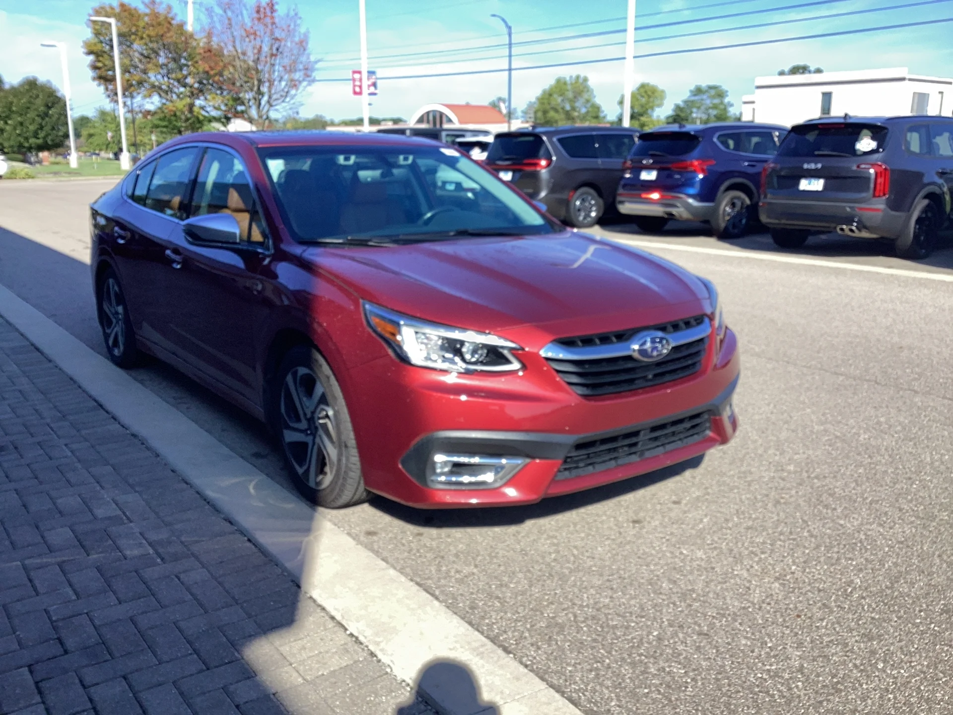 Used 2021 Crimson Red Pearl Subaru Touring XT image 1