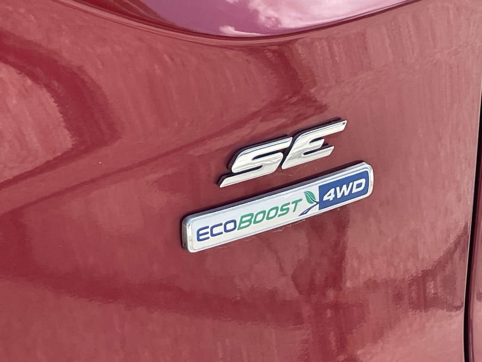 Used 2014 Ruby Red Tinted Clearcoat Ford SE image 15