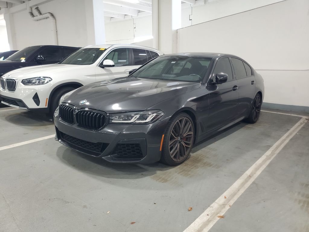 Certified Used 2023 Dark Graphite BMW M550i xDrive image 1