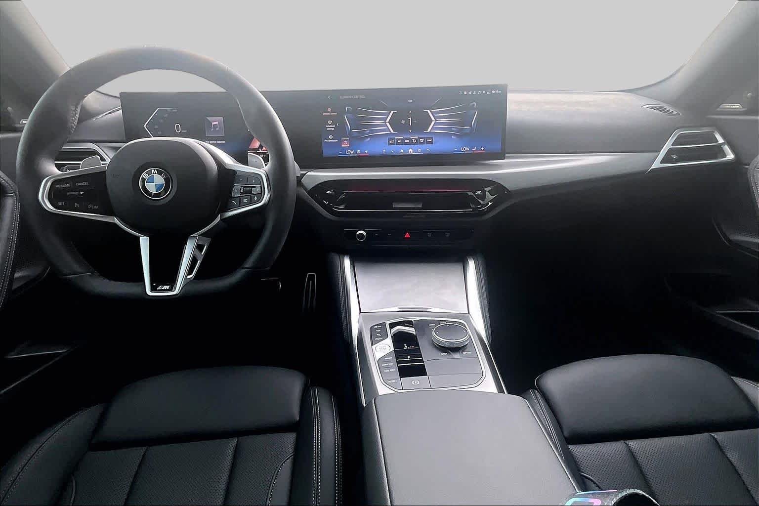 Used 2025 Black Sapphire Metallic BMW 230i xDrive image 14