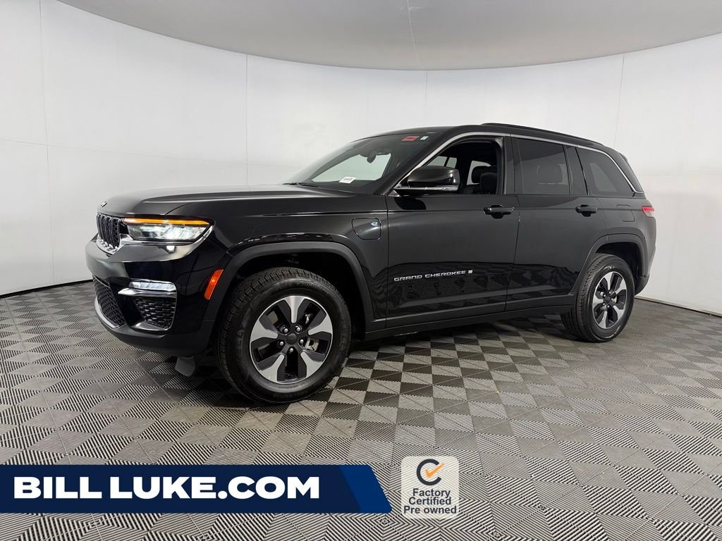 Certified Used 2024 Black Jeep 4xe image 1