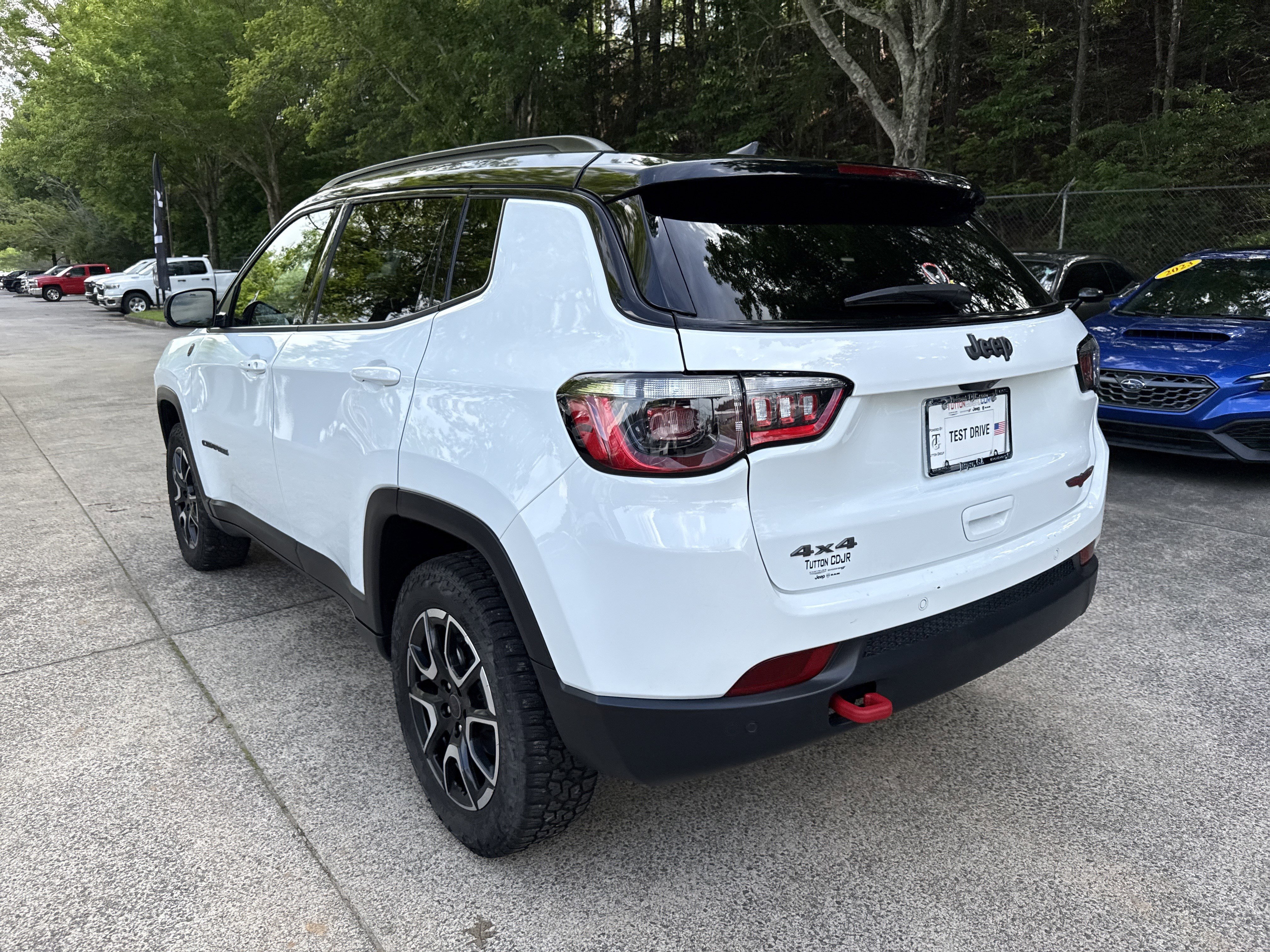 Used 2025 Bright White Clearcoat Jeep Trailhawk image 5
