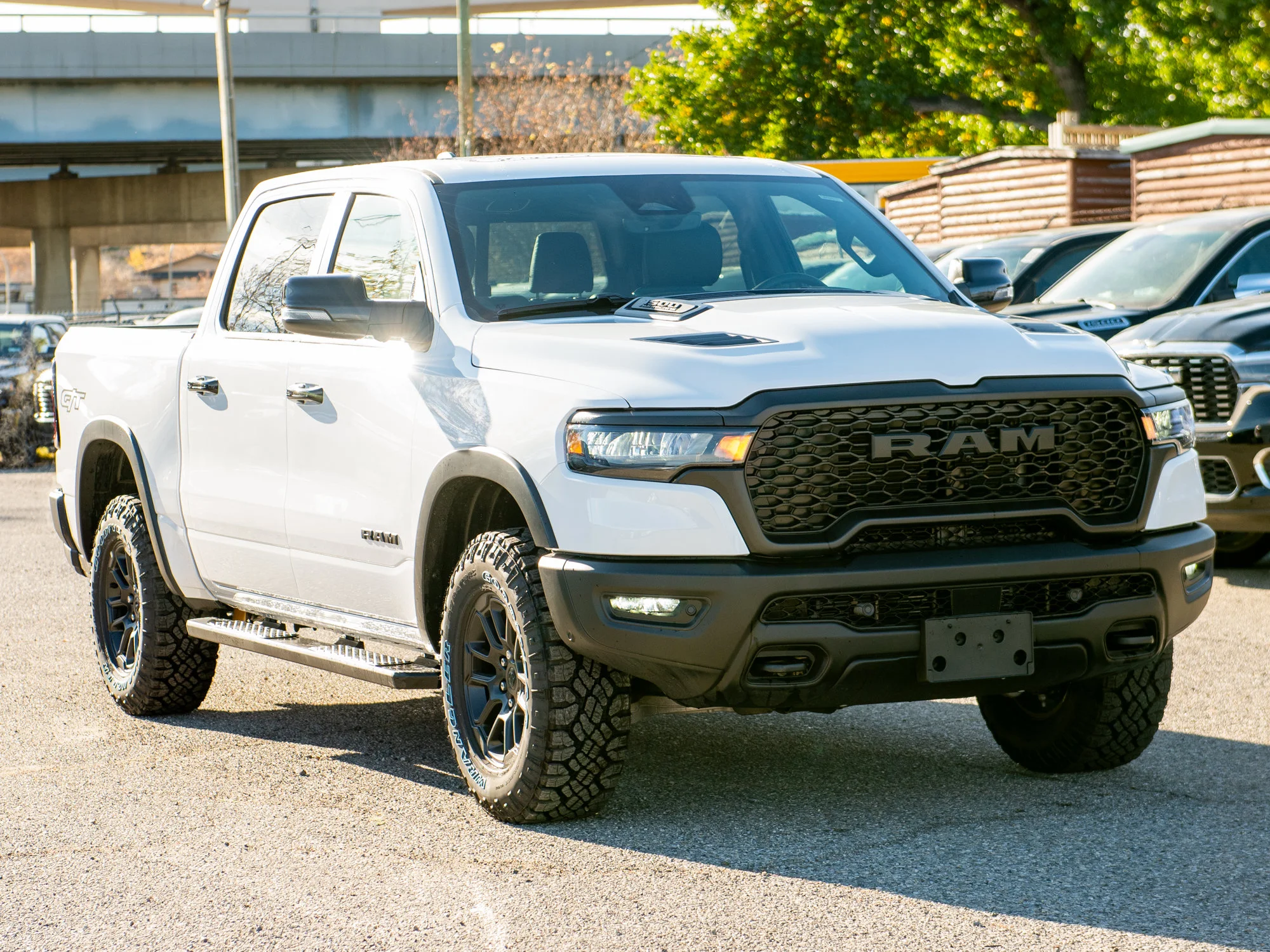 New 2026 White RAM Rebel G/T* Crew Cab 4x4, Pano Sunroof, Passive Cold End Exhaust, Passenger Screen image 7