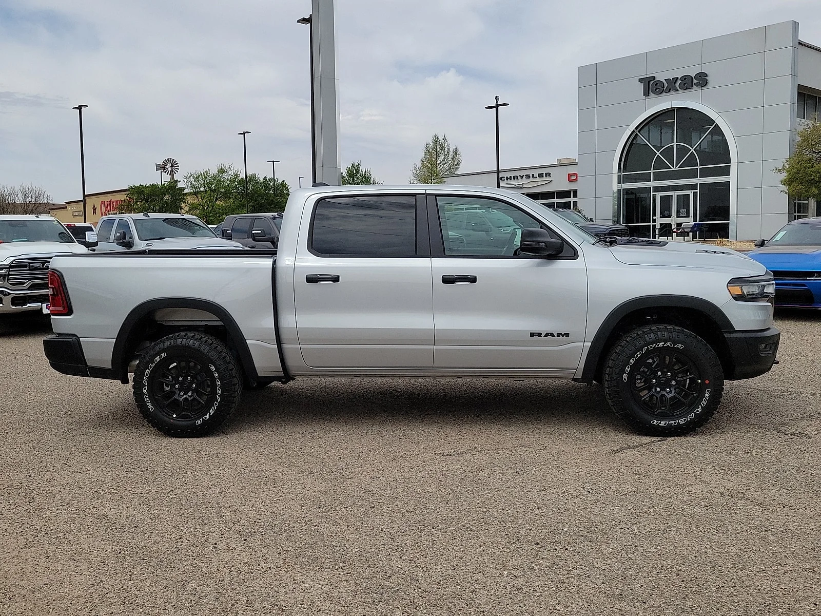 New 2026 Silver Zynith Ram REBEL CREW CAB 4X4 5
