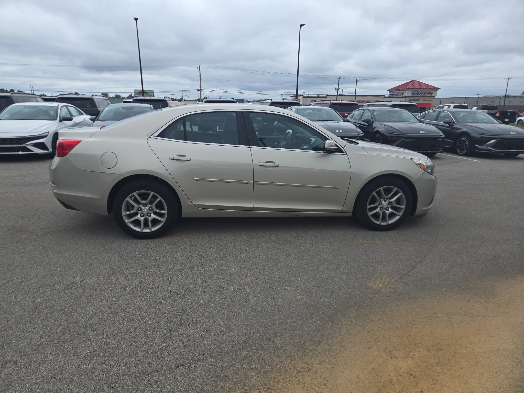 Used 2016 Champagne Silver Metallic Chevrolet LT image 2