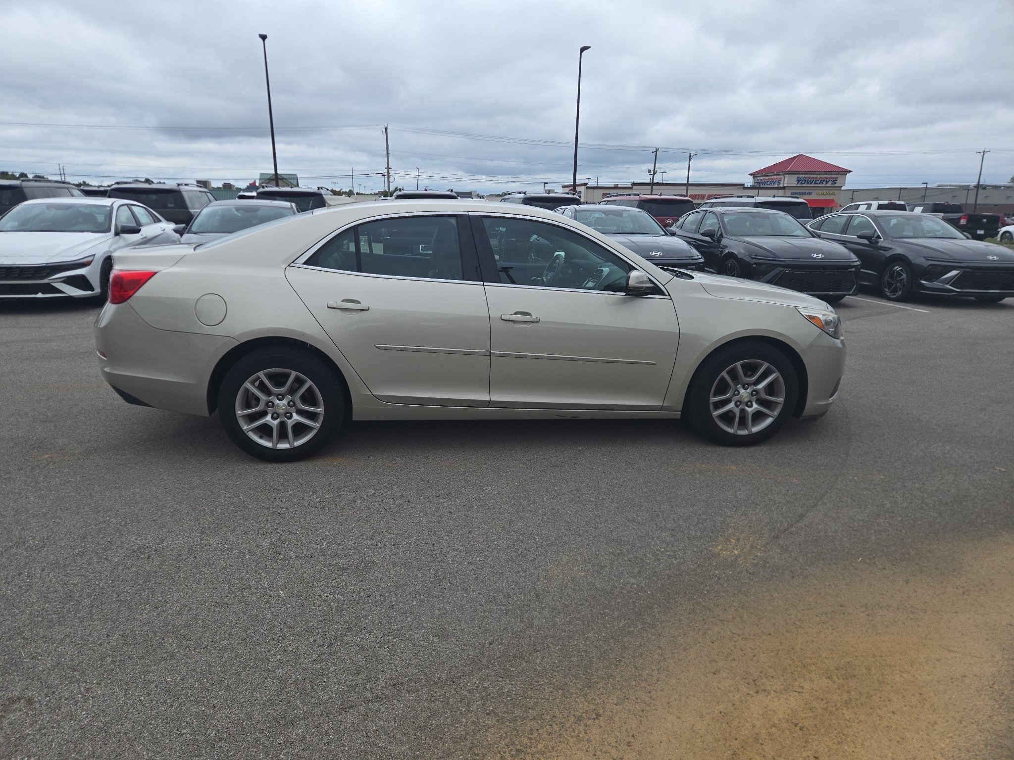 Used 2016 Champagne Silver Metallic Chevrolet LT image 2