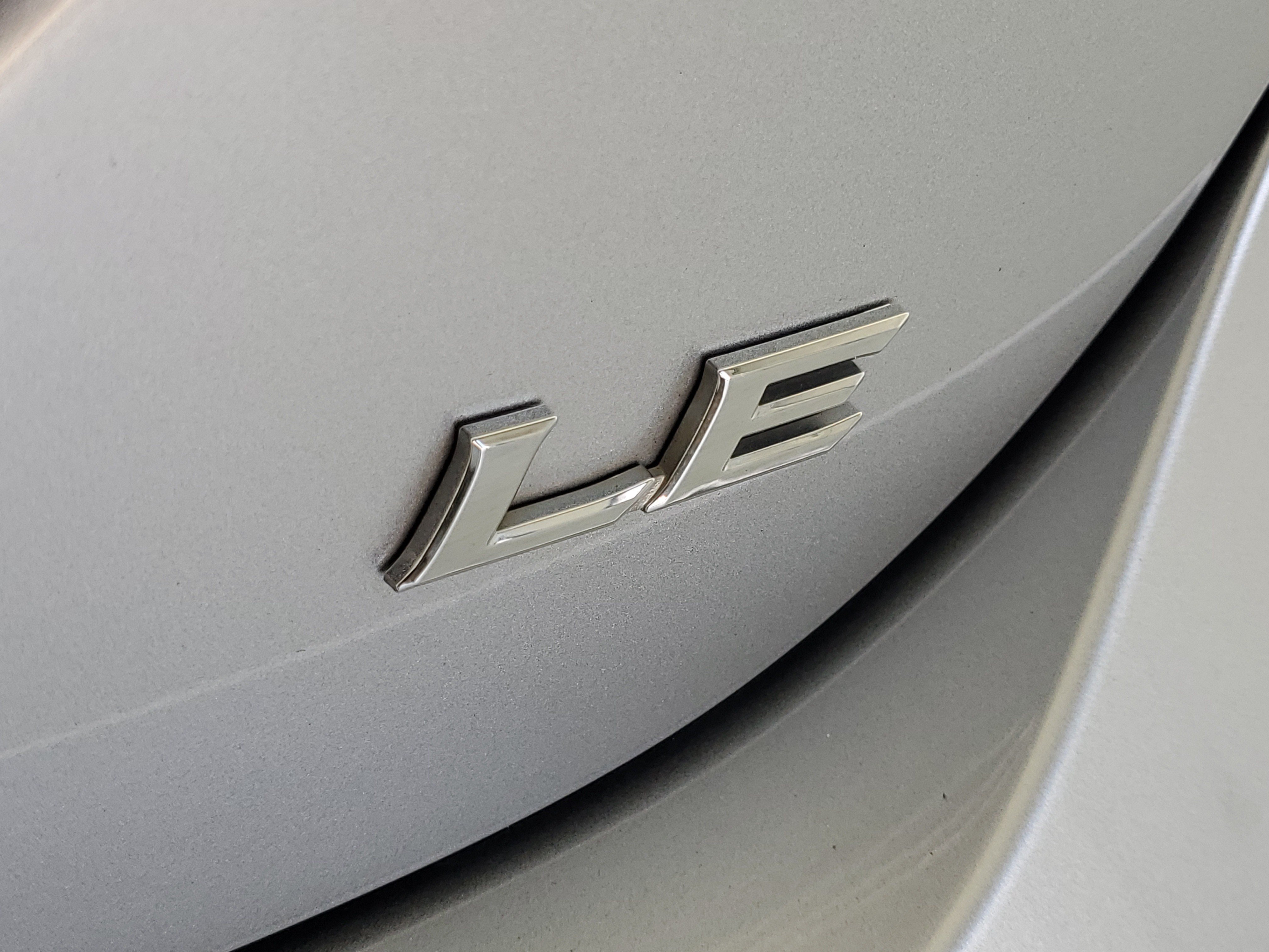 Used 2022 Celestial Silver Metallic Toyota LE image 9