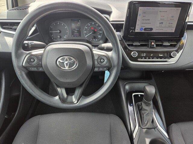 Used 2023 Classic Silver Metallic Toyota LE image 21