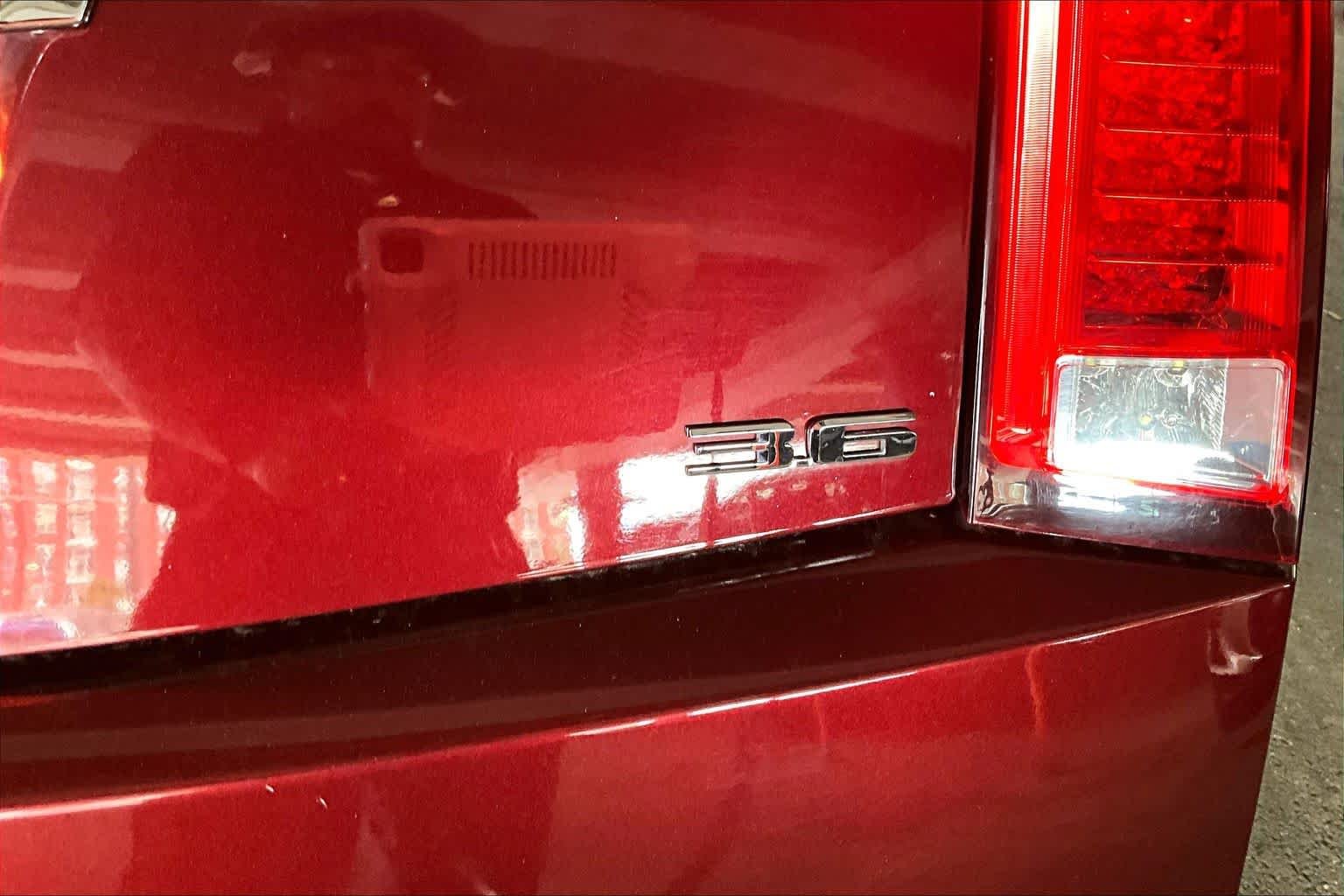Used 2014 Crimson Red Metallic Cadillac Premium image 9