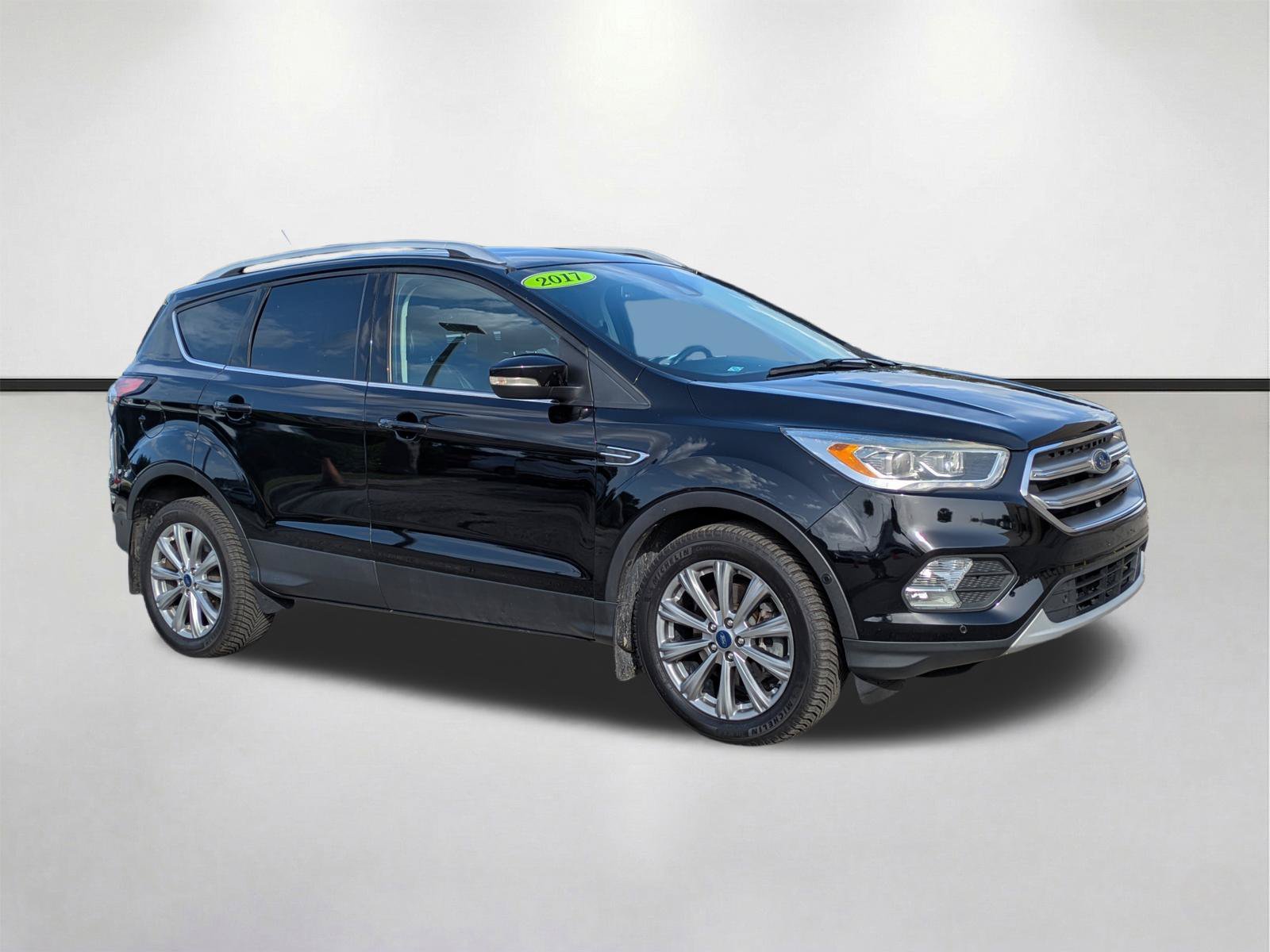 Used 2017 Shadow Black Ford Titanium image 1