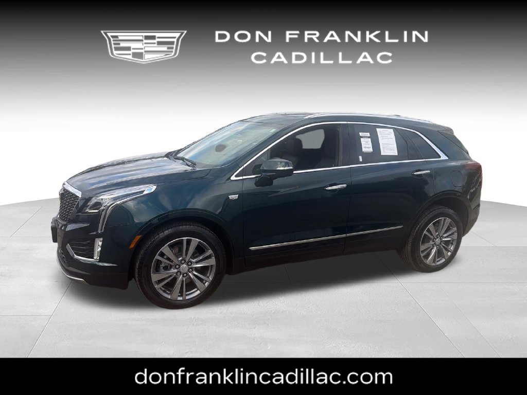 Used 2025 Green Cadillac Premium Luxury image 1