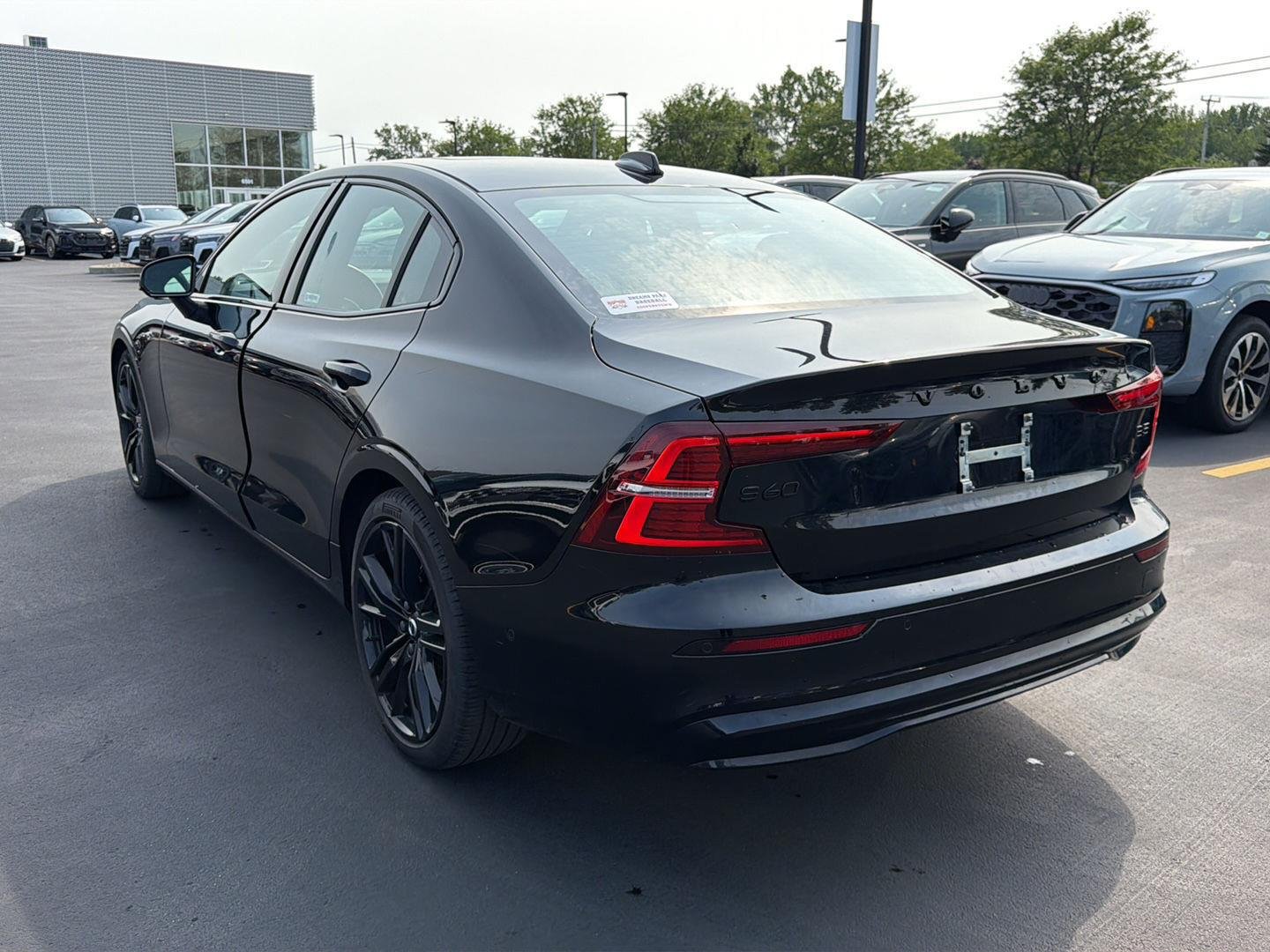 Used 2024 Onyx Black Metallic Volvo Plus Black Edition image 5