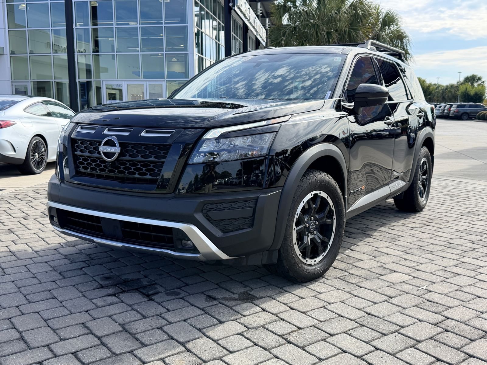Used 2024 Super Black Nissan Rock Creek image 1
