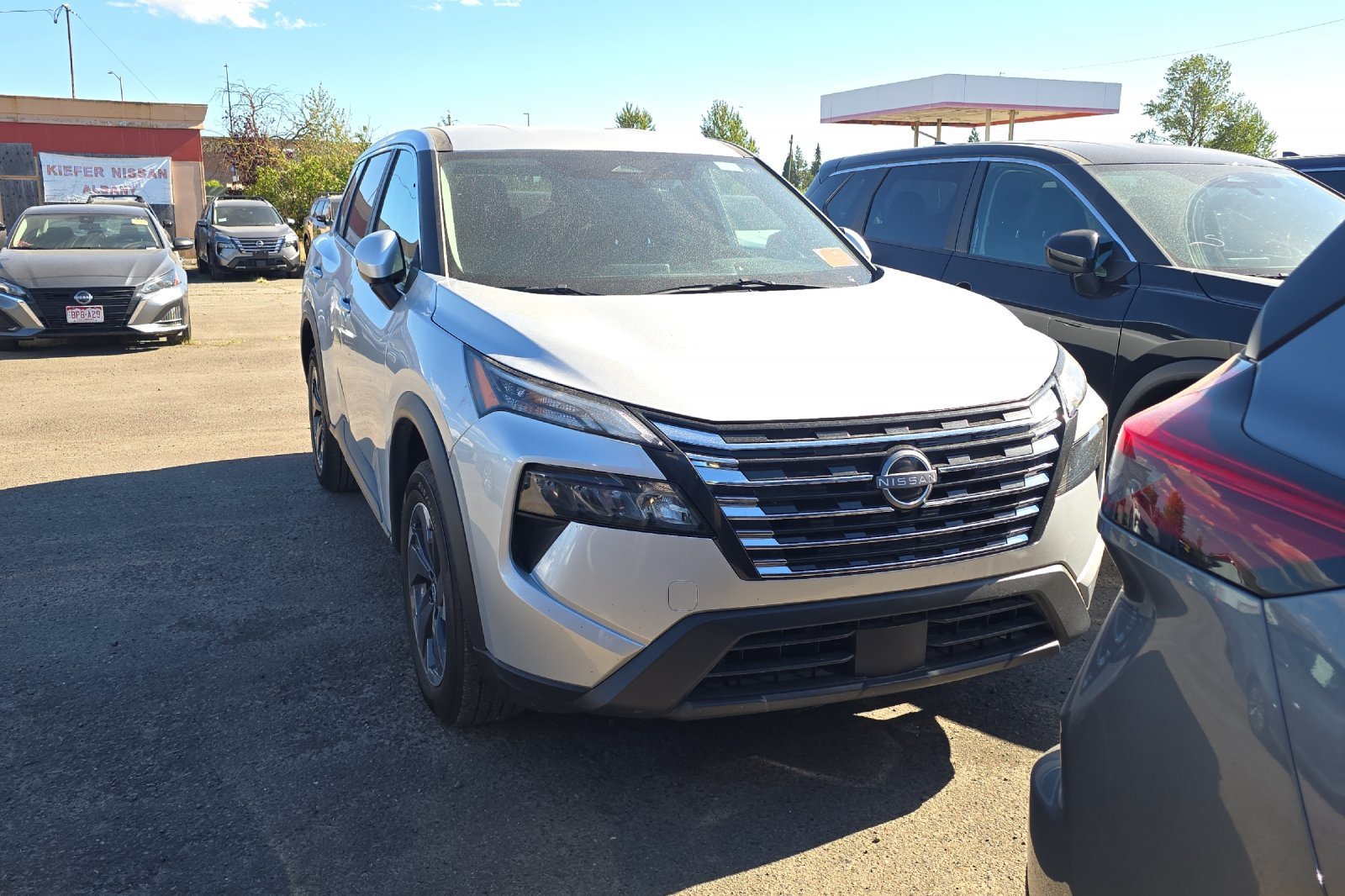 Used 2025 Brilliant Silver Metallic Nissan SV image 2