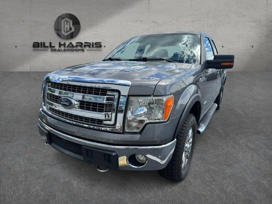 Used 2013 Gray Ford XLT image 1