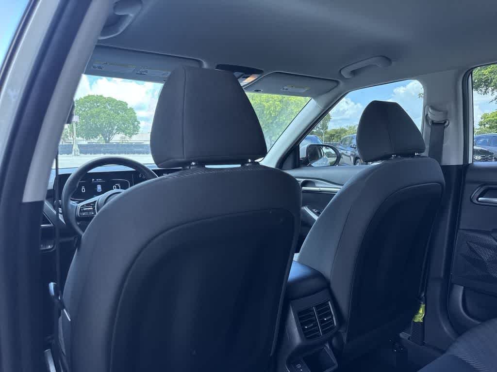 Used 2024 Snow White Pearl Kia LX image 23