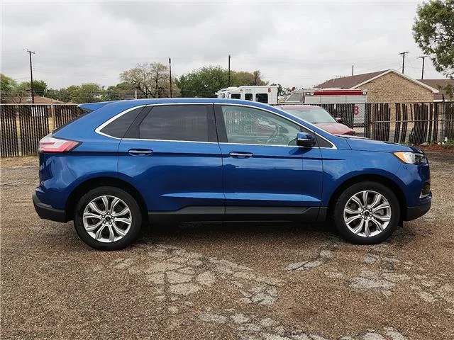 Used 2024 Blue Ford Titanium All-Wheel Drive image 5