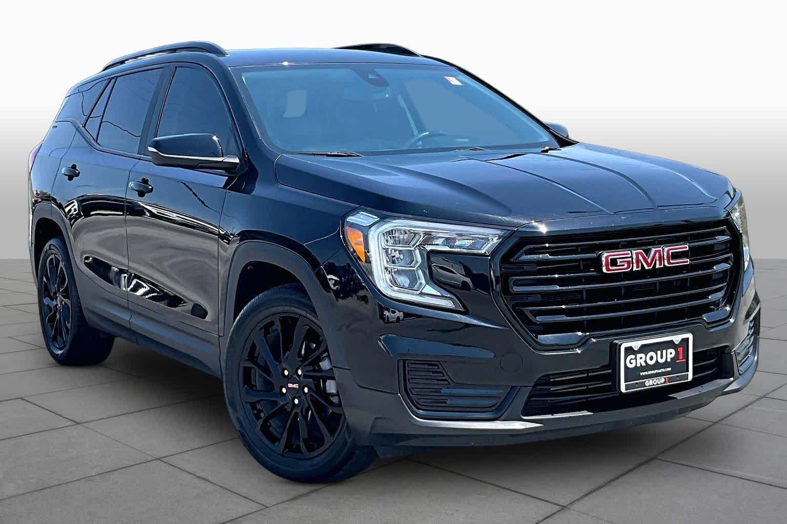 Used 2024 Ebony Twilight Metallic GMC SLE image 3