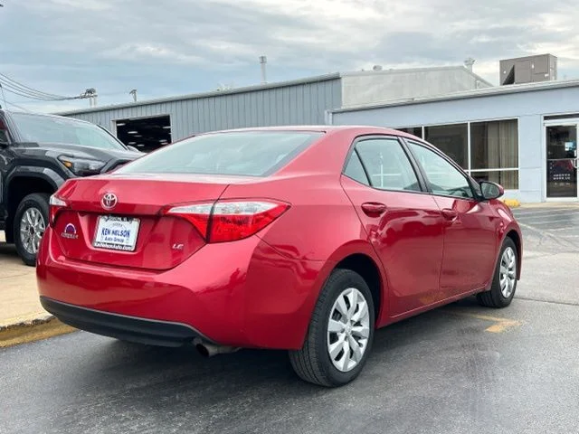 Used 2016 Barcelona Red Metallic Toyota LE image 12