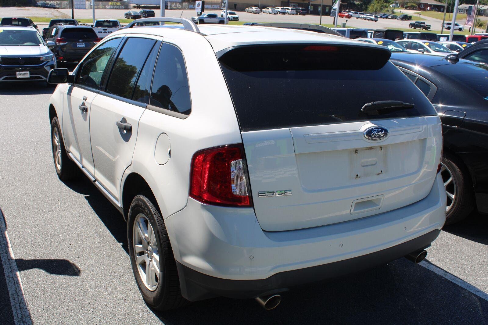Used 2012 White Suede Ford SE image 6