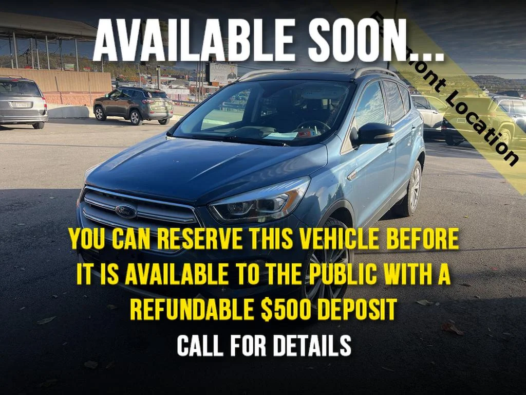 Used 2018 BLUE METALLIC Ford Titanium image 1