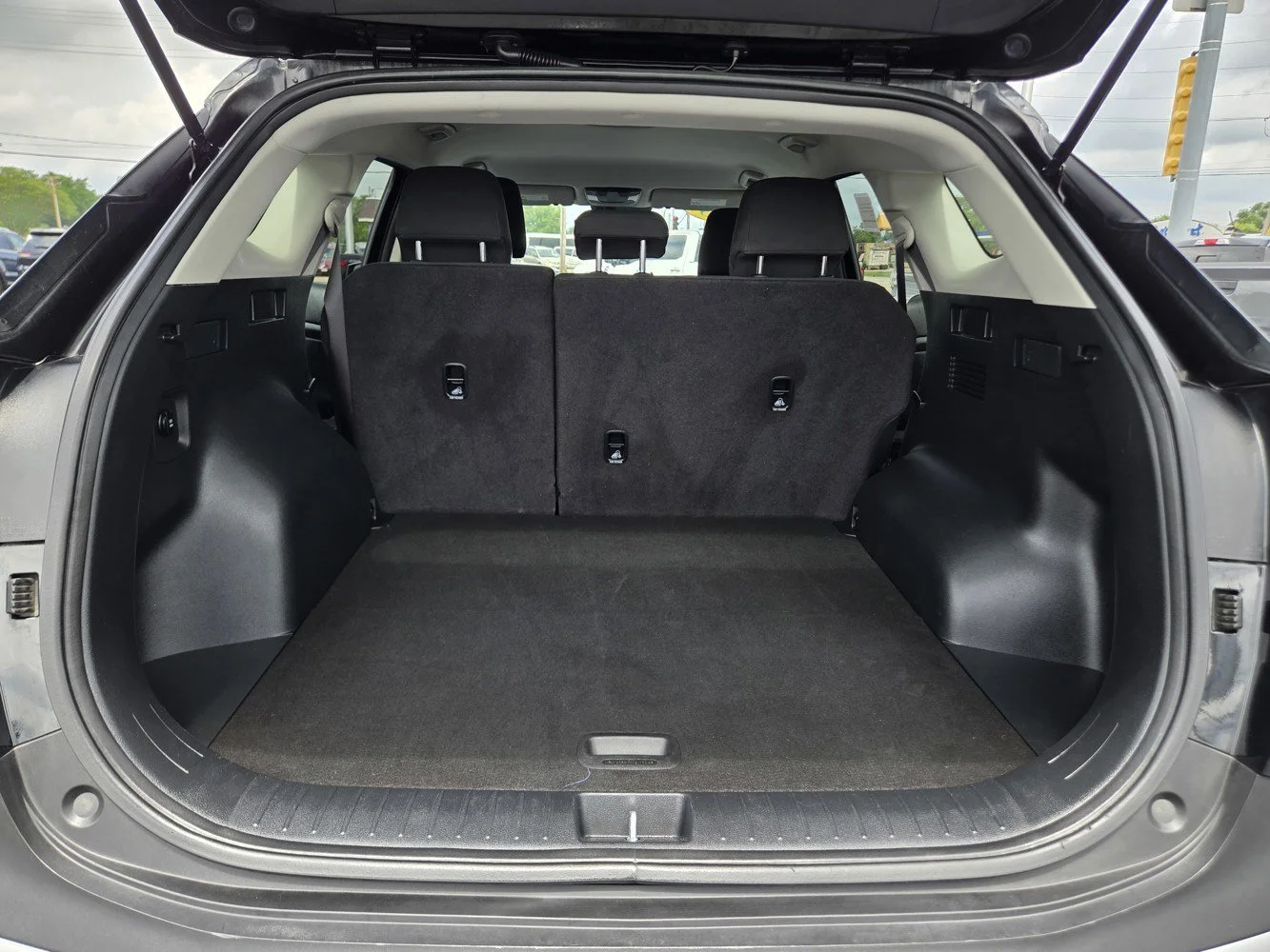 Used 2025 Ebony Black Kia LX image 34