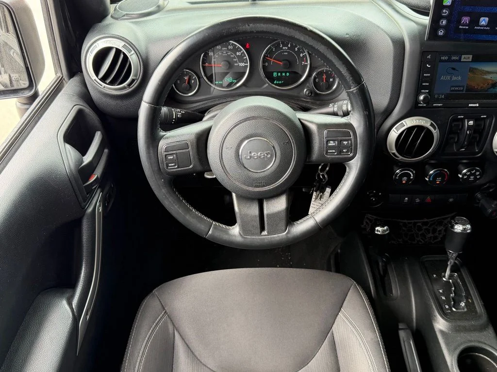 Used 2018 Black Jeep Unlimited Sahara image 9