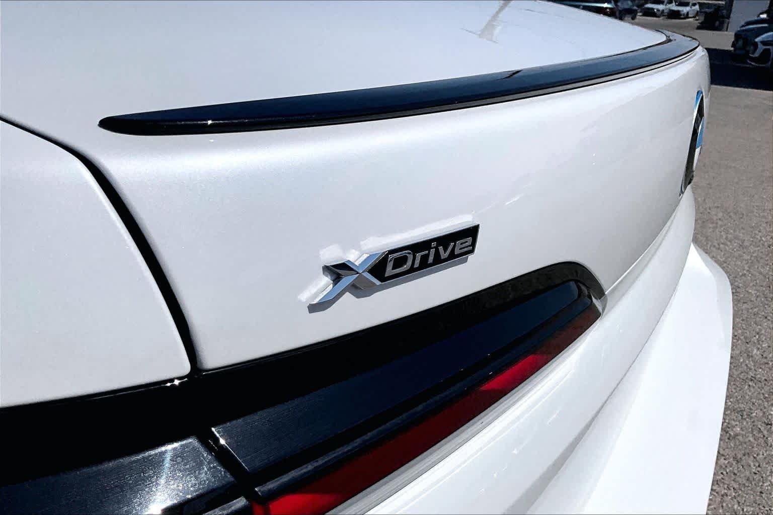 Used 2025 Mineral White Metallic BMW 750e xDrive image 30