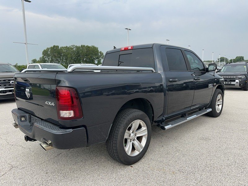 Used 2016 Granite Crystal Metallic Clearcoat Ram 4WD Crew Cab 140.5" Sport image 6