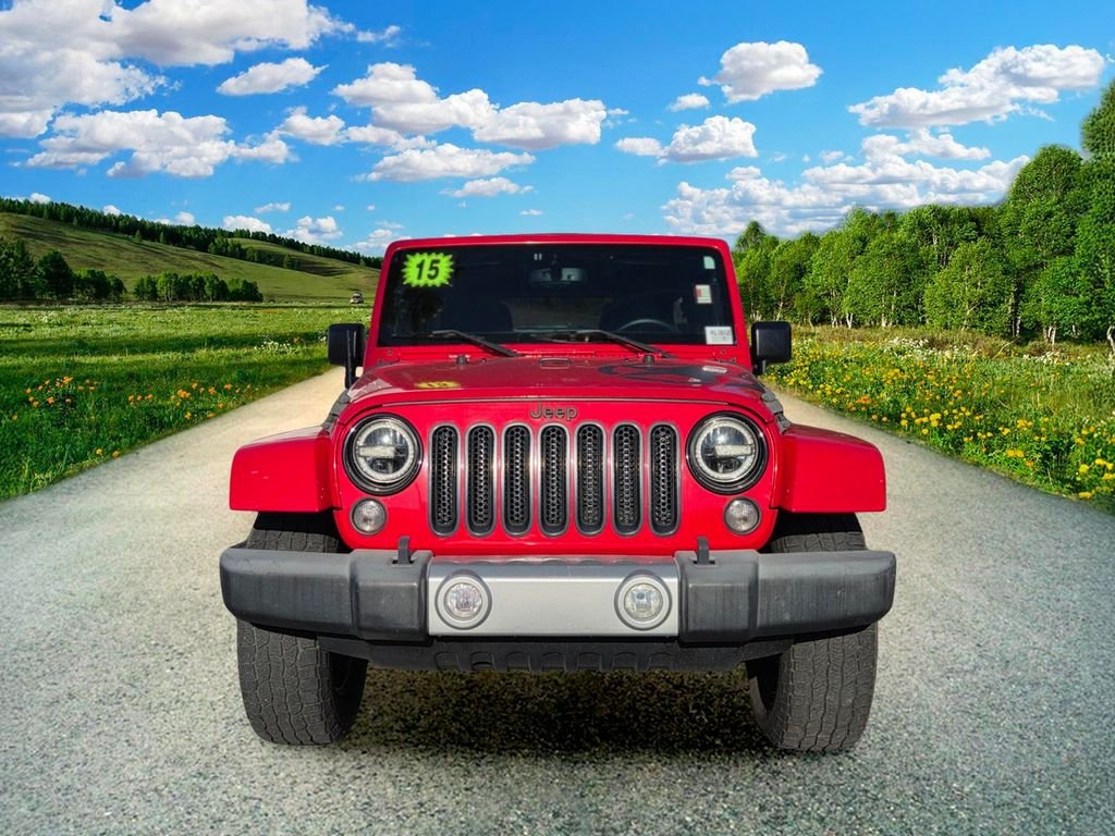 Used 2015 Red Jeep Unlimited Sahara image 8