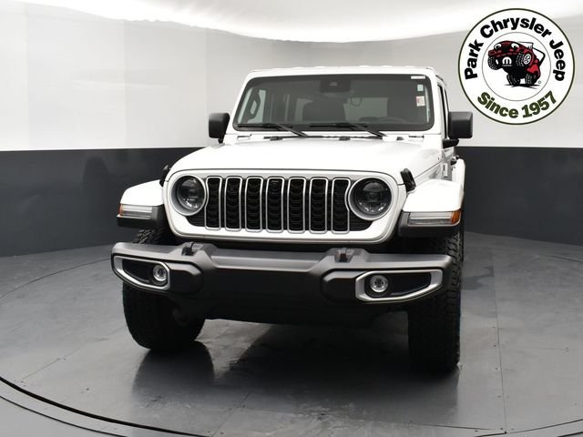 Used 2024 Jeep Wrangler 4-Door Sahara with VIN 1C4PJXEGXRW361255 for sale in Burnsville, Minnesota