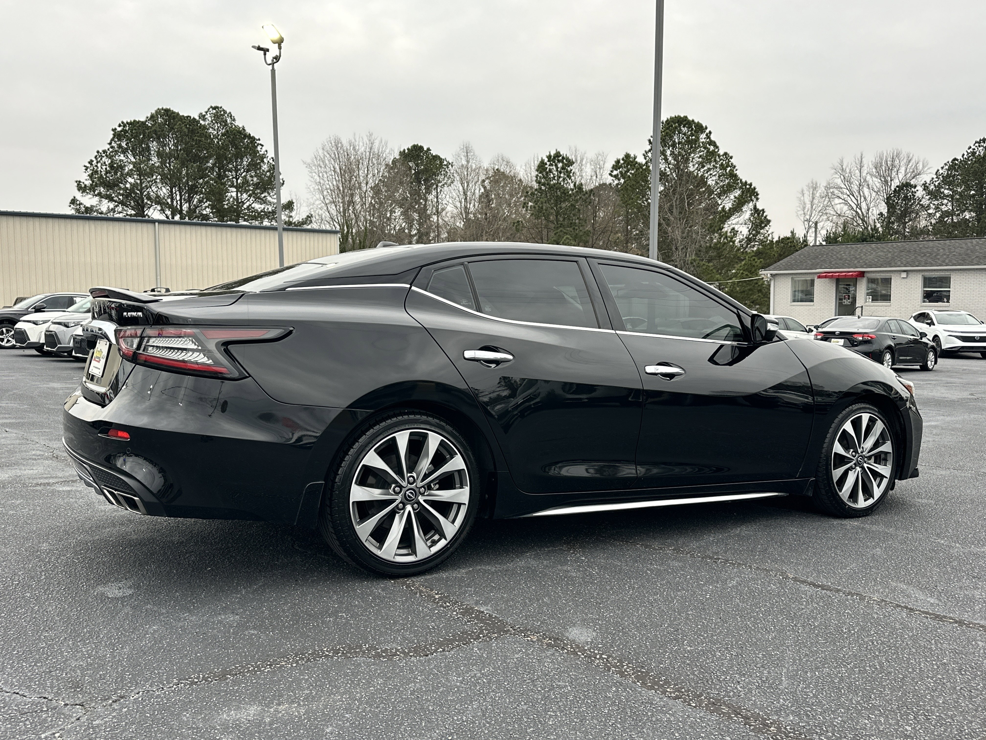 Used 2023 Super Black Nissan Platinum image 8
