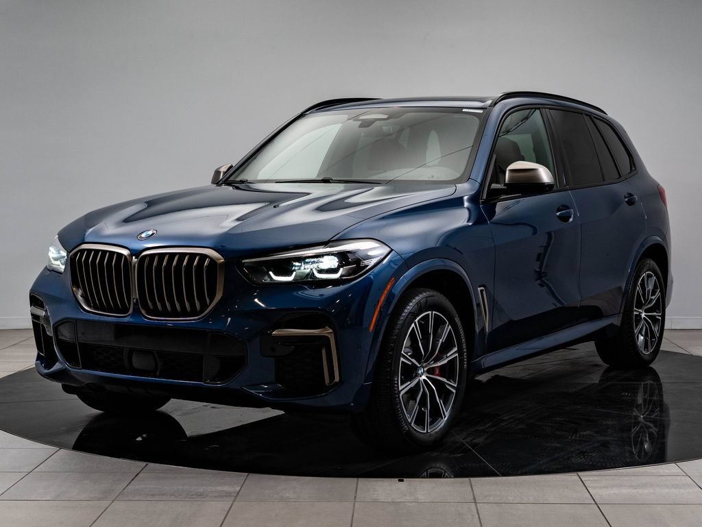 Used 2022 Phytonic Blue Metallic BMW M50i image 1