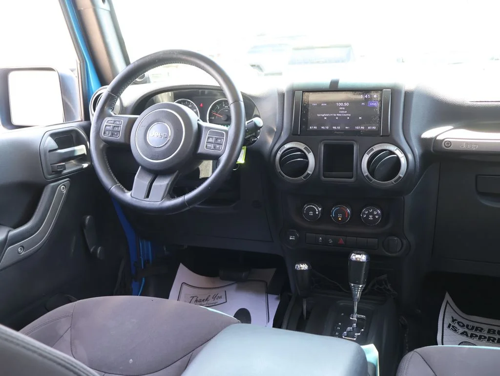 Used 2014 Blue Jeep Unlimited Sport image 12