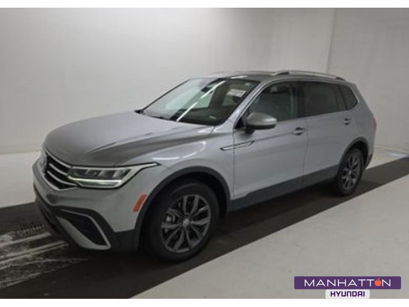 Used 2025 Pyrite Silver Metallic Volkswagen SE 4Motion image 1