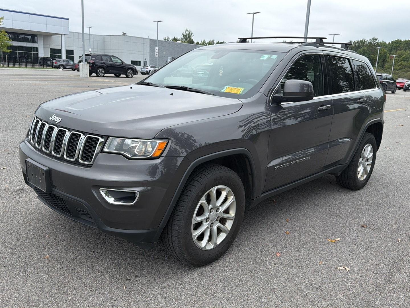 Used 2021 Granite Crystal Metallic Clearcoat Jeep Laredo E image 7