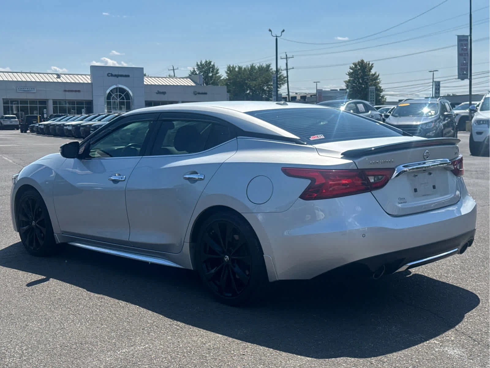 Used 2017 Brilliant Silver Nissan SR image 3