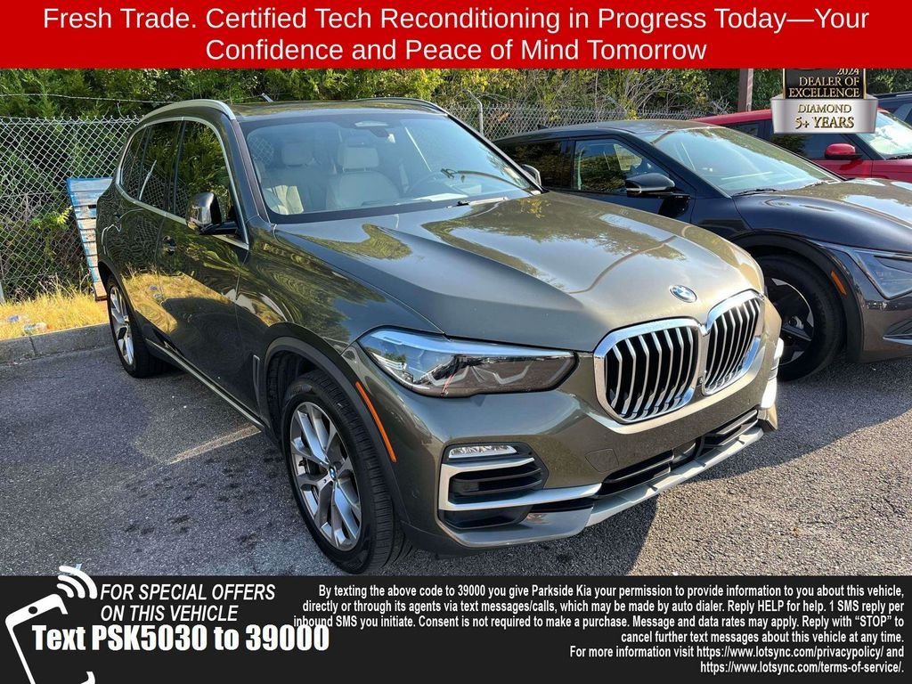 Used 2021 Green BMW xDrive40i image 1