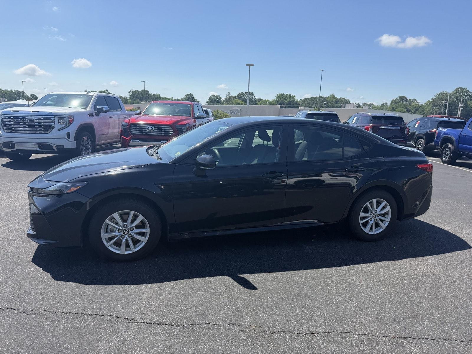 Used 2025 Midnight Black Metallic Toyota LE image 4