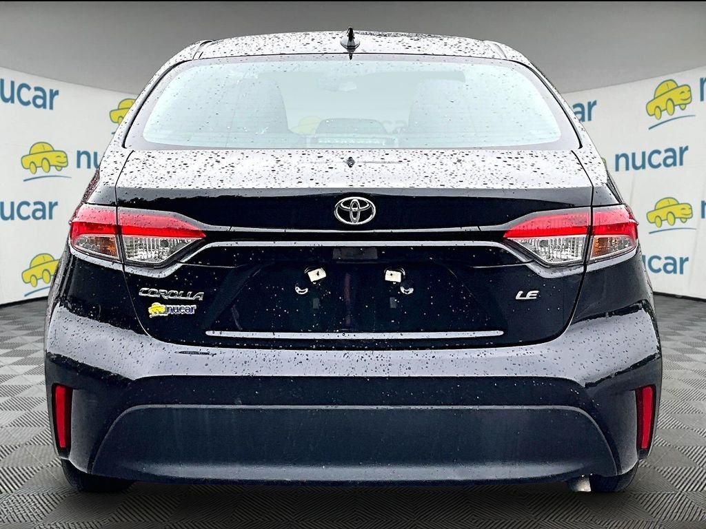 Used 2024 Black Toyota LE image 5