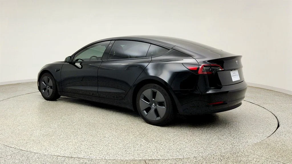 Used 2023 Solid Black Tesla RWD image 7