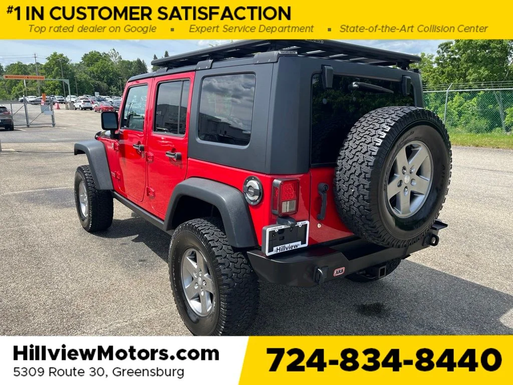Used 2010 Flame Red Jeep Unlimited Rubicon image 3