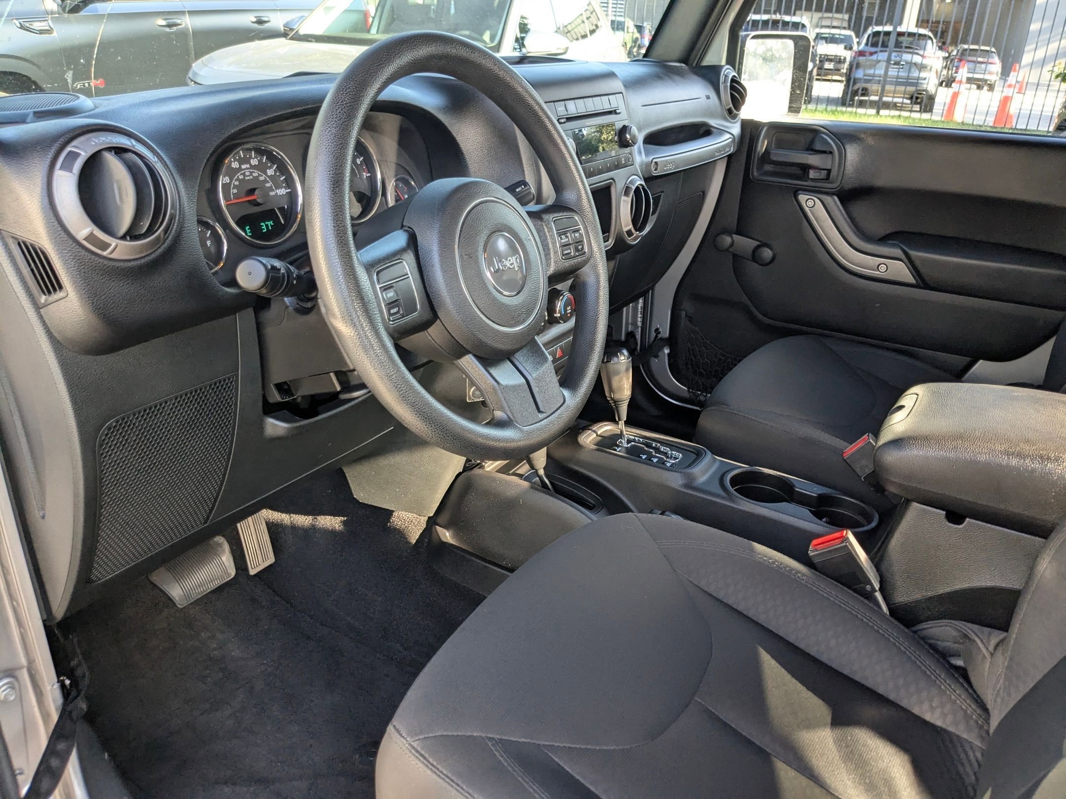 Used 2015 Billet Silver Metallic Clearcoat Jeep Sport image 10