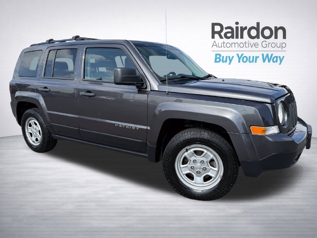 Used 2016 Gray Jeep Sport image 1