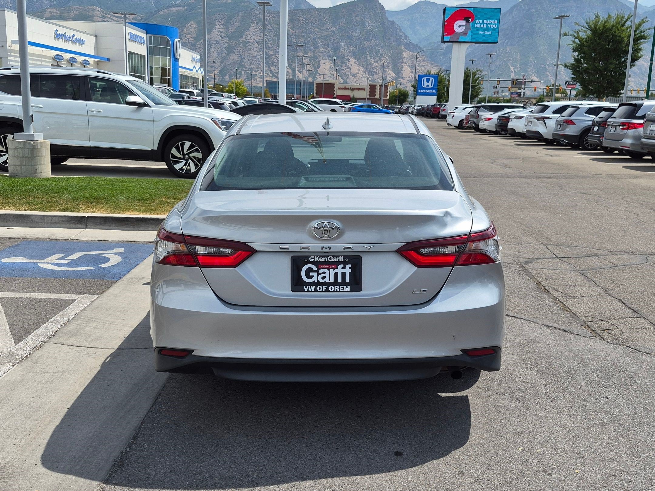 Used 2021 Celestial Silver Metallic Toyota LE image 4