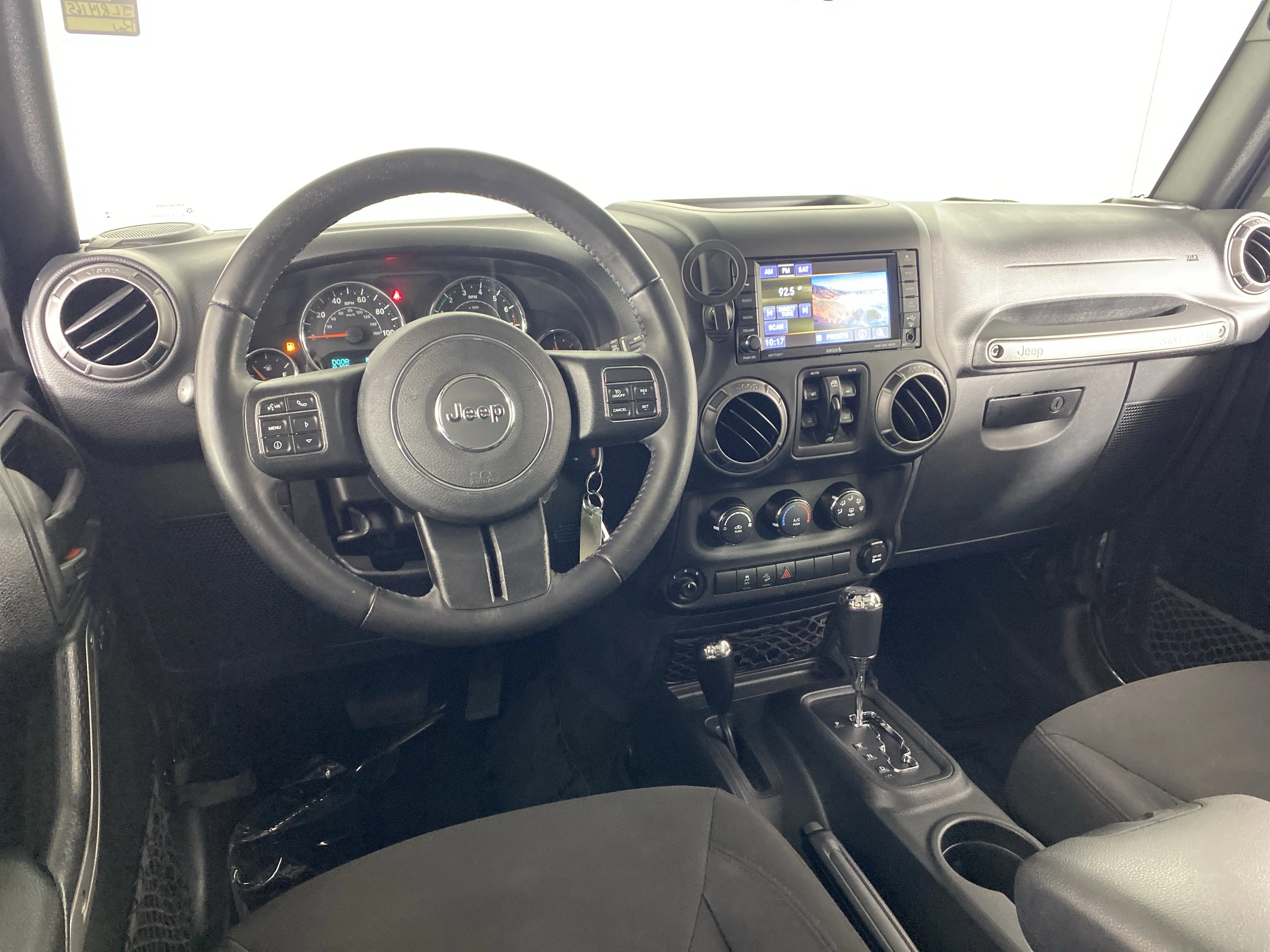 Used 2018 Granite Crystal Metallic Clearcoat Jeep Sport S image 15