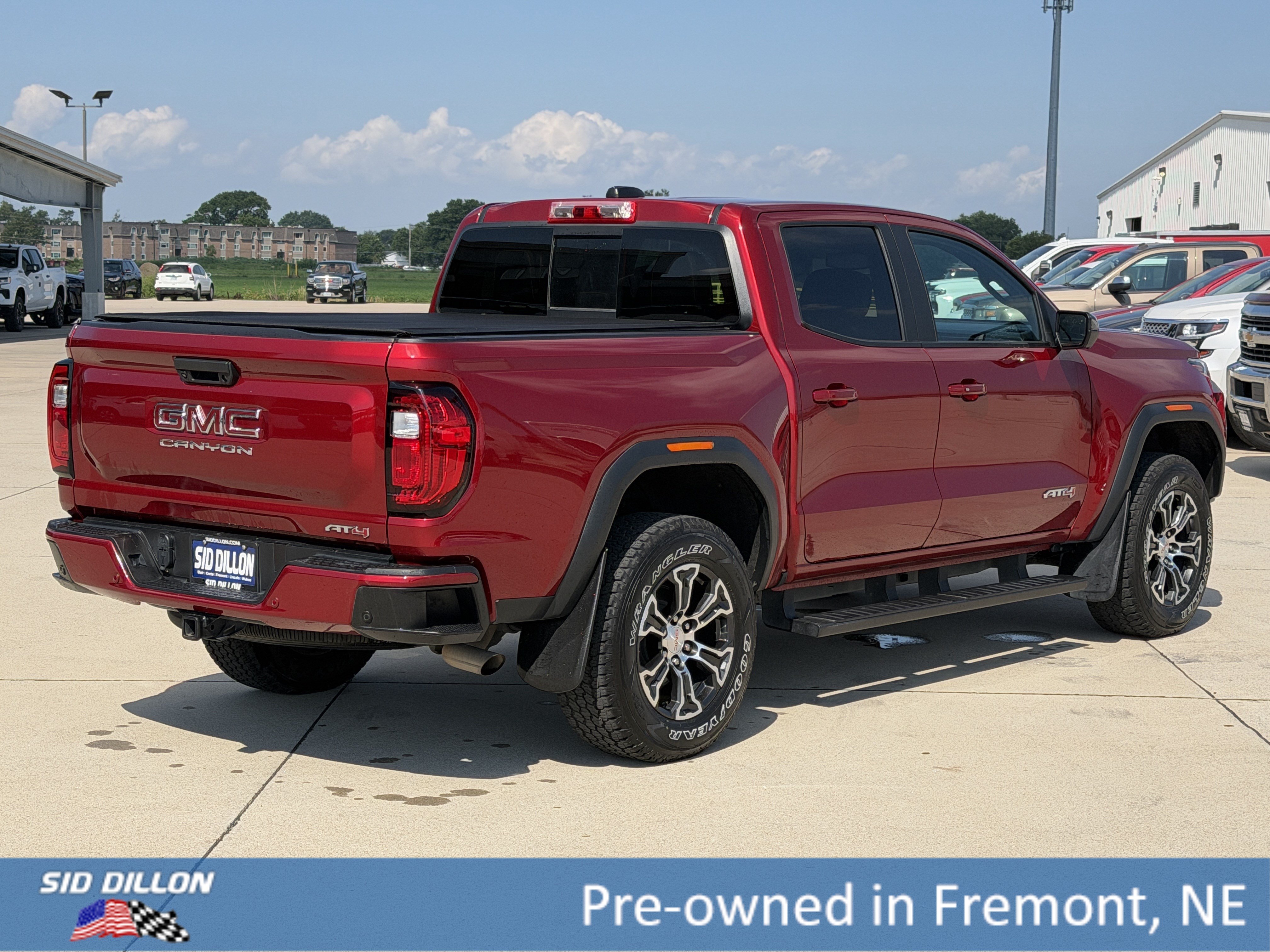 Used 2024 Volcanic Red Tintcoat GMC 4WD AT4 image 4
