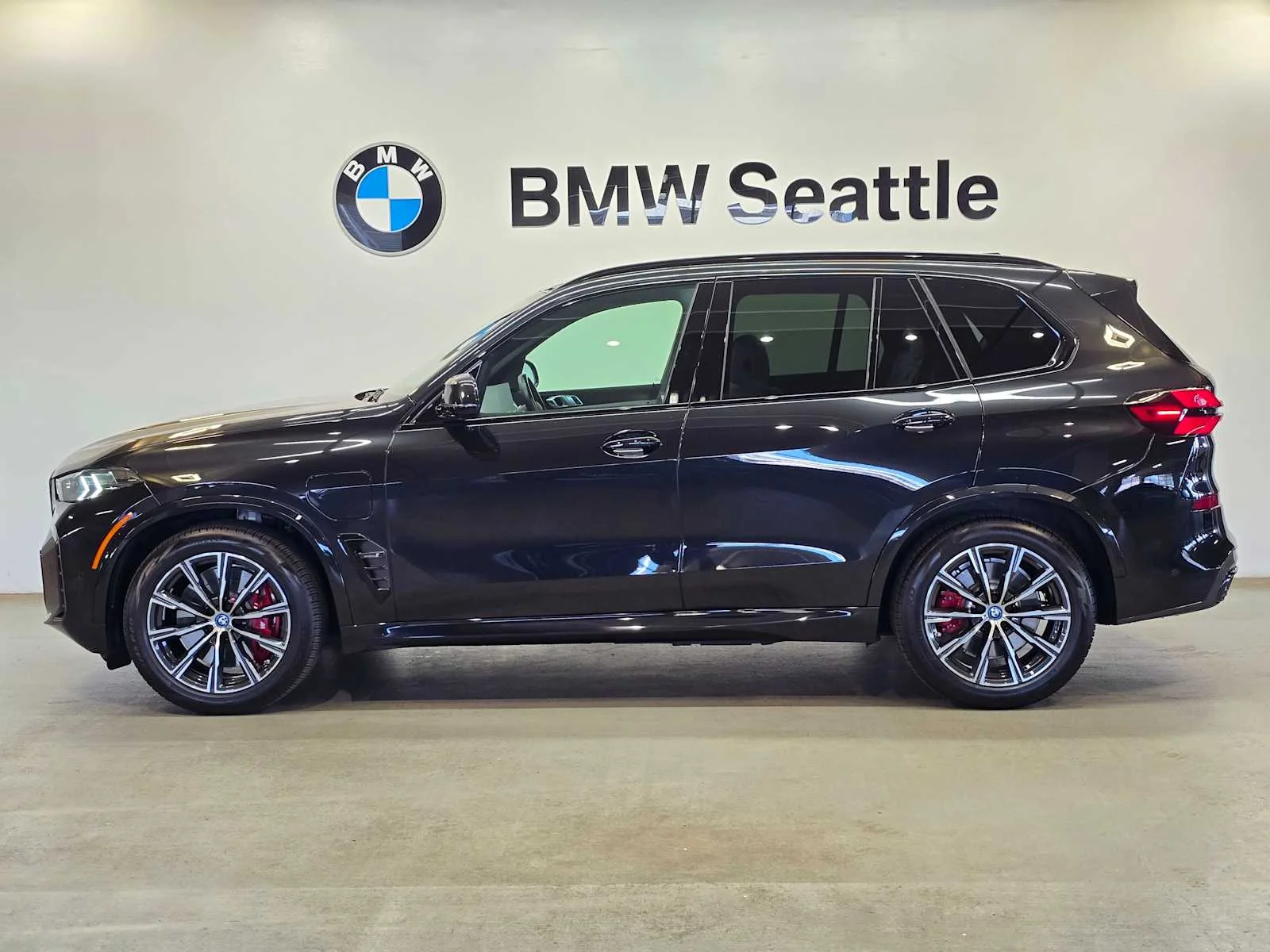 Used 2024 Black Sapphire Metallic BMW xDrive50e image 3